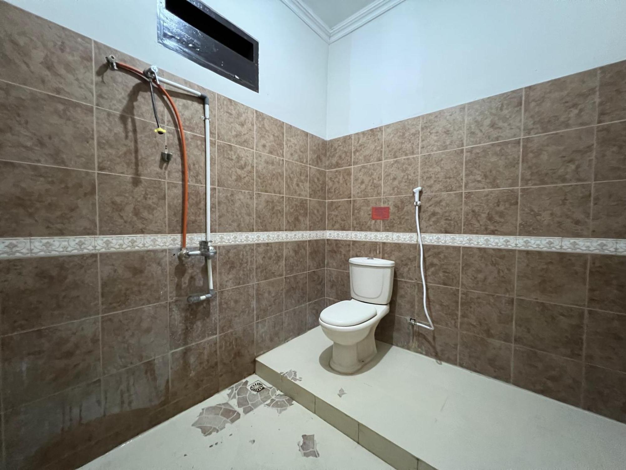 Oyo 92098 Kost Orange Syariah Ξενοδοχείο Μακασάρ Εξωτερικό φωτογραφία